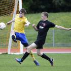 University's Peter Overmire nips in ahead of William McIntyre (Queenstown Rovers) to win...