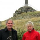 Unveiling near . . . Dunedin South Rotary Club members Norman Firth and Ginny Green descend from...