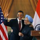 US President Barack Obama, left, and Indian Prime Minister Manmohan Singh, embrace following a...