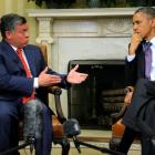 US President Barack Obama (R) listens to remarks by Jordan's King Abdullah prior to a bilateral...