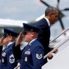 US President Barack Obama steps aboard Air Force One at Andrews Air Force Base near Washington....