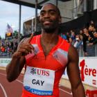 US sprinter Tyson Gay gestures after winning the 100m at the Lausanne Diamond League meeting in...