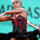 USA's Venus Williams returns the ball to Spain's Arantxa Parra Santonja during their second round...