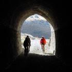 Users of the Otago Central Rail Trail, emerging from a Poolburn Gorge tunnel, helped generate $12...