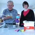 Using brightly coloured utensils and magnifiers, Jack Rutherford prepares to do some baking while...