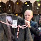 Butterflies - the Hospice Op-shop volunteer Gerry Elliman has been forced to chain down fur coats...