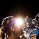 Victoria Azarenka of Belarus poses with the Daphne Akhurst Memorial Cup after defeating Li Na of...