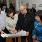 Victoria Rd residents (from left) Steve Hunt, Liz and Rene Lammers and Sue Hunt examine a drawing...