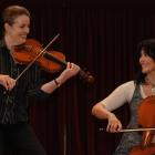 Violin lecturer Tessa Petersen,(left)and Heleen Du Plessis at  Marama Hall recently. Photo by...
