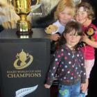 Visiting the Great Rugby Road Trip in Oamaru yesterday are (rear, from left)  Hana  and Zara...