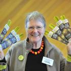 Visual Impairment Charitable Trust Aotearoa trustee Dr Lynley Hood displays Vizbands in the...