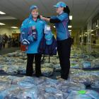 Volunteer VIP driver Sue Lee, of Waikouaiti,  is fitted with her Rugby World Cup volunteer's...