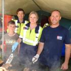 Volunteering at the Lake Hawea Volunteer Fire Brigade sausage sizzle stand are (from left)...