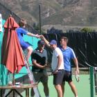 Agreeable ending . . . Josh Roberts (10) shakes hands with New Zealand tennis player Alistair...