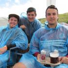 Ready for rain are Cam Bain, Ryan Littlejohn and Dillen Von Solms, all of Dunedin. Photos by Mark...