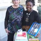 Waitaki Boys High School librarian Hilary Bishop (left) and Getrude Matshe display some of the...