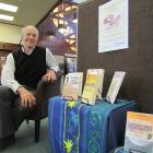 Waitaki district library manager Philip Van Zijl with some of the Oamaru Public Library's...