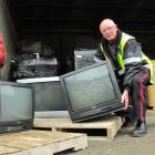 Waitaki Resource Recovery Trust business manager Dave Clare yesterday with examples of...