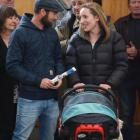 Waiwera South couple Mark and Madeline Anderson are all smiles  after making the winning bid at...