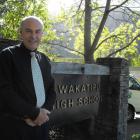 Wakatipu High School stand-in principal Paul O'Connor stands outside the school's office area....