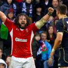 Wales' Adam Jones reacts after the referee awarded them a penalty in the final minute of their...