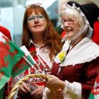 Wales fans await the arrival of their team in Wellington. Photo: REUTERS/Mike Hutchings