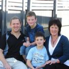 Walter and Lynlee von Ballmoos with their autisic sons Reagan (9) (at rear) and Hayden (7). Photo...