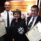 Wanaka businessmen, from left, Tim Hudson and Chris Lumsden flank St John Central Otago district...