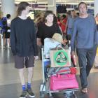 Wanaka family Luke Facer (17), Nina Lunn and Julian Facer, arrive at Dunedin International...