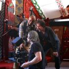 Wanaka film-maker Darren Simmonds (second from right) and crew members work behind the camera...