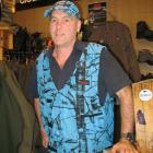 Wanaka retailer Mark Sanders models his 'blaze blue' hunting range in his shop on Thursday. Photo...