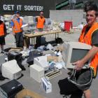Wanaka Wastebusters business collections manager Jeremy Bisson (foreground) with (from left)...