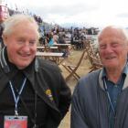 Warbirds Over Wanaka founder Sir Tim Wallis (left) chats with former RAF and test pilot David...