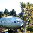 Warrington's "flying saucer" house may be shooting off to a new base on Auckland's beach front....