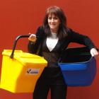 Water and Waste Services business support leader Narelle Barbour shows the proposed new  yellow,...