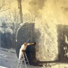 Wayne Jenkins, of Holmes Decorating, puts the finishing touches to the  installation of Double...