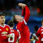 Wayne Rooney celebrates after scoring his first goal. Photo Reuters