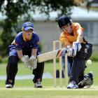 Wellington batsman Sarah Taylor sweeps the ball during a one-day game against Otago in Mosgiel on...