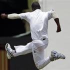 West Indies' captain Darren Sammy celebrates after taking the wicket of Pakistan's Mohammad...