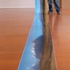 Weston photographer Derek Golding with an 8m photograph, believed to be New Zealand's widest. The...