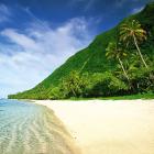 White sand stretches along Ofu Island Beach.