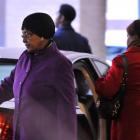 Winnie Mandela (L), ex-wife of former president Nelson Mandela, leaves the Medi-Clinic Heart...