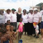 With a German volunteer (right), the women who assisted with a preschool centre and some of their...