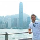 With Hong Kong Island as a backdrop, Mr Morriss relaxes during a day off between flights.