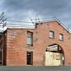 Work progresses on the former stables building in Crawford St, Dunedin. Photo by Peter McIntosh.
