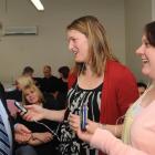 Workshop presenter Arana Pearson (left) explains the voice-hearing workshop to mental health...
