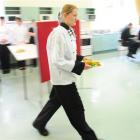 Year 13 hospitality pupil Tabitha Comins delivers a meal at yesterday's appreciation lunch at...