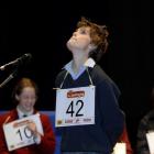 Year 9 pupil Tom Stephenson (12), of Waitaki Boys High School, searches for the answer during the...