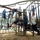 Years 6, 7 and 8 pupils test out the new playground at Balclutha Primary School yesterday. Photo...