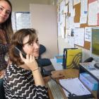 Youthline Dunedin mentors Olivia Scobie (left) and Sarah Zydervelt often take calls from...